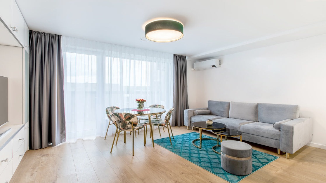 Salón moderno climatizado por AeroClima